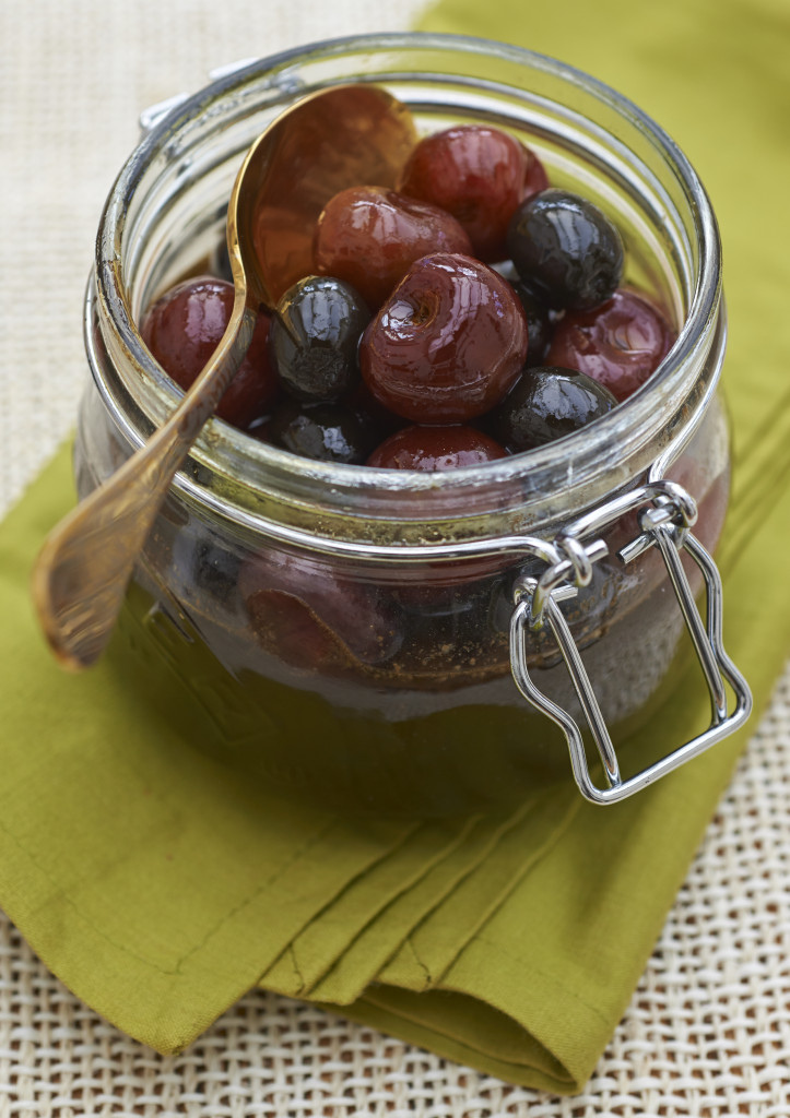 Yummily sweet olives in a bottle