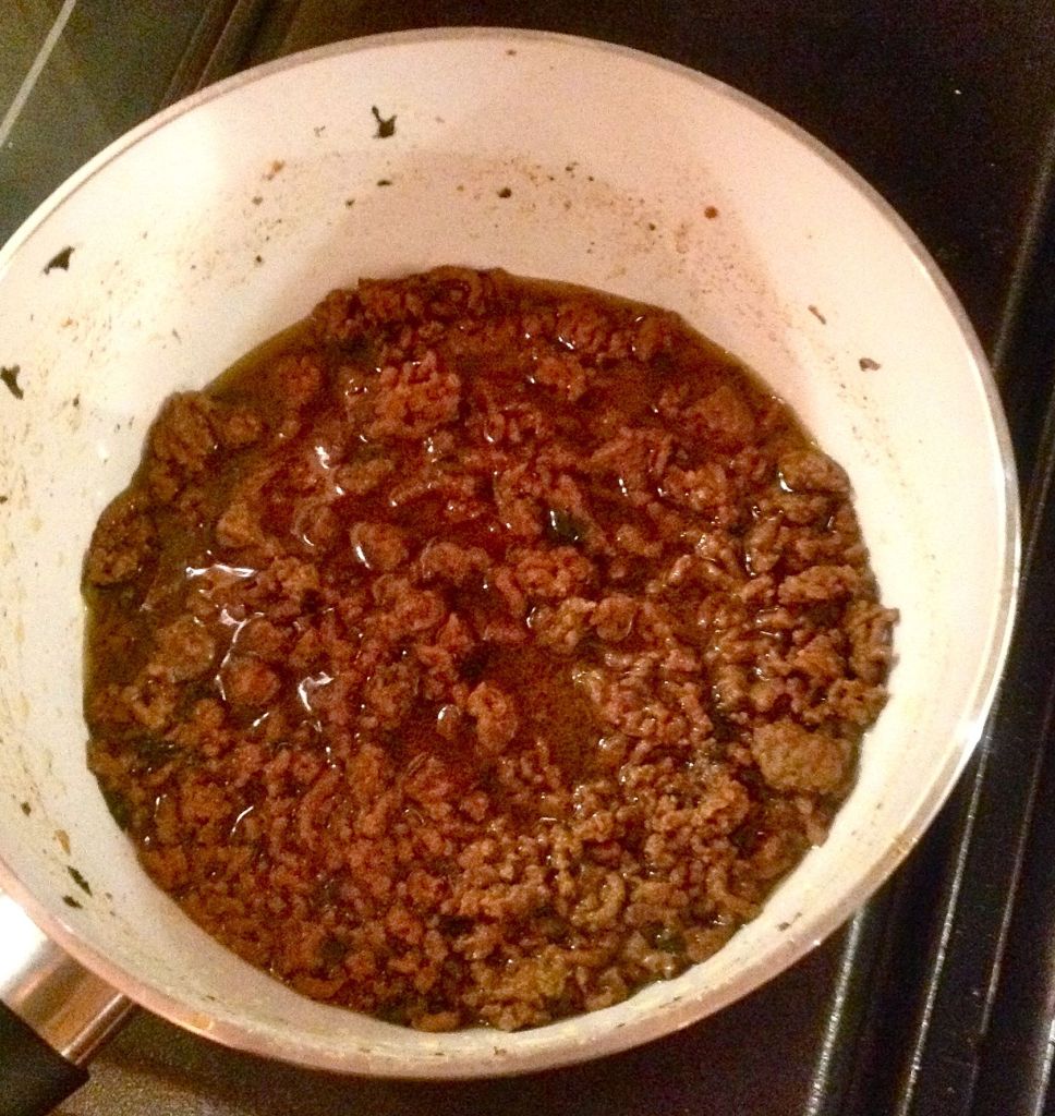 The tasty mince simmering on the stove top