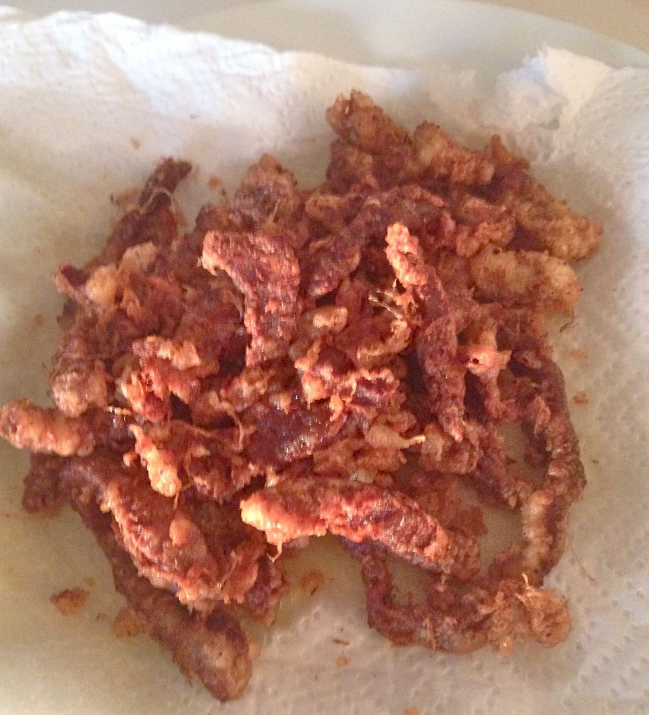 The crispy beef drains while I cook the sauce